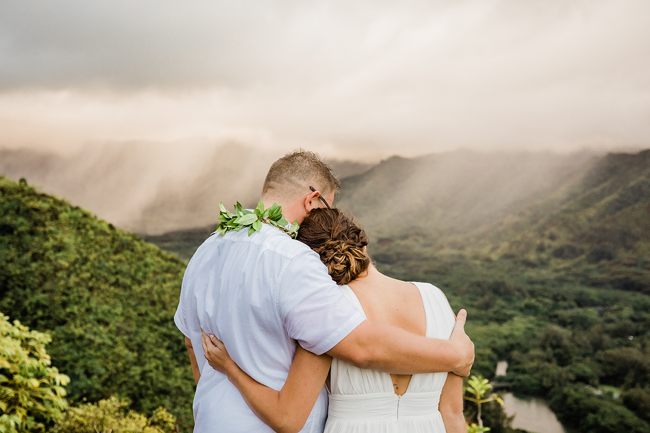 bride and groom on a hike while eloping in Hawaii