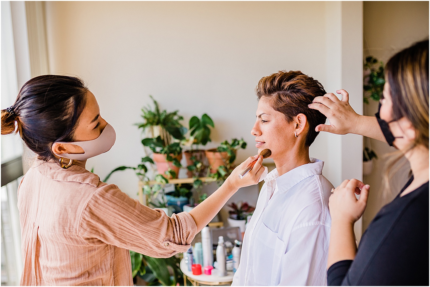 Brides getting ready together