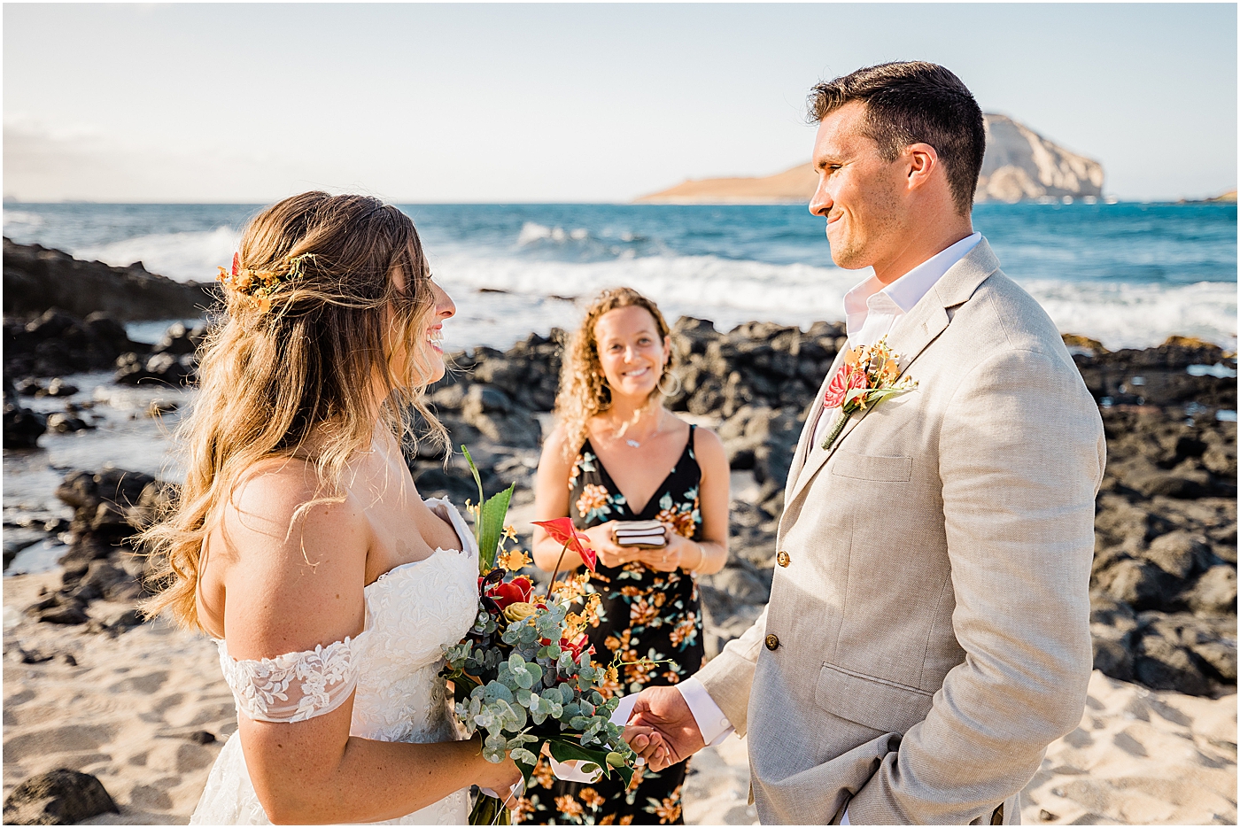 bride and groom during wedding ceremony with hawaii elopement planning