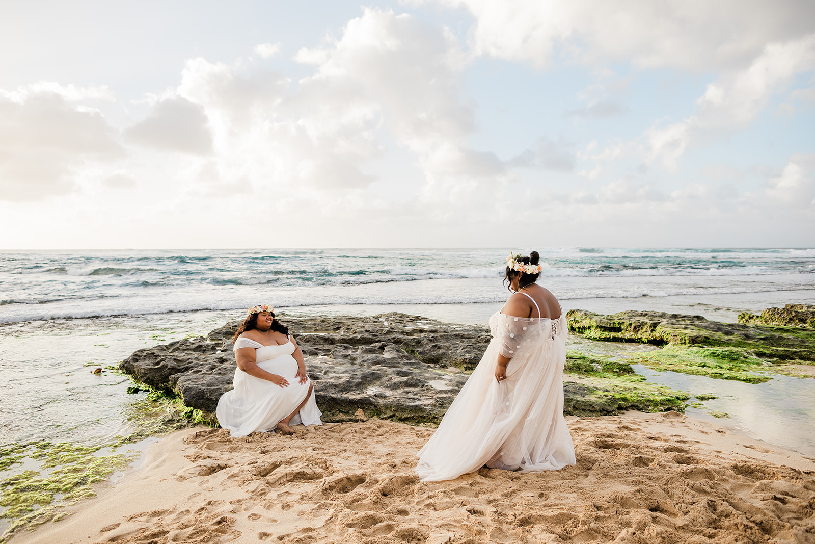 Couple celebrating their wedding at one of the best places to elope on Oahu’s North Shore with ocean views